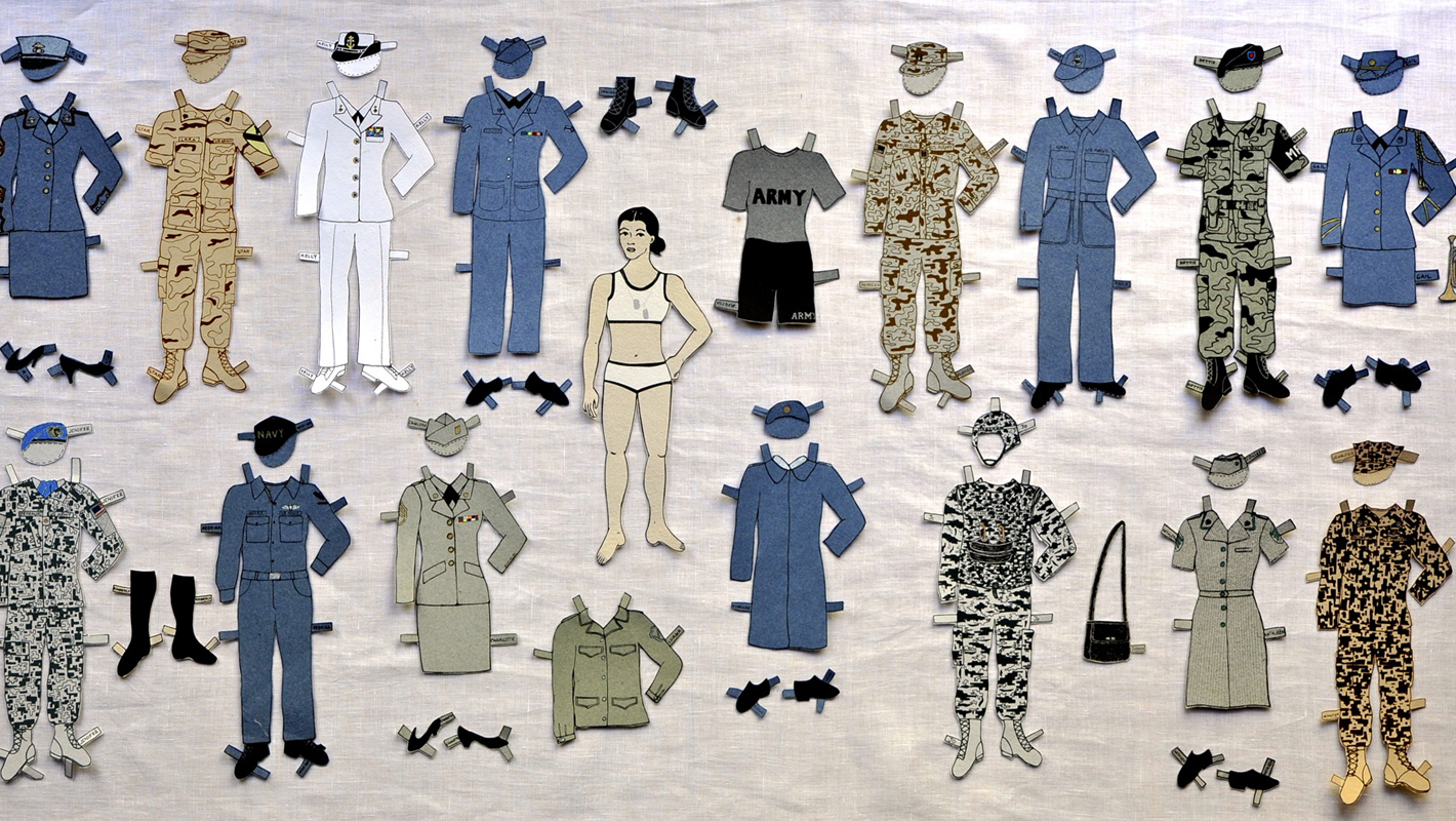 Featured artists include Pam DeLuco, who creates military-inspired paper dolls.