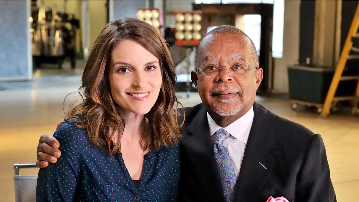 Tina Fey with Finding Your Roots host Henry Louis Gates