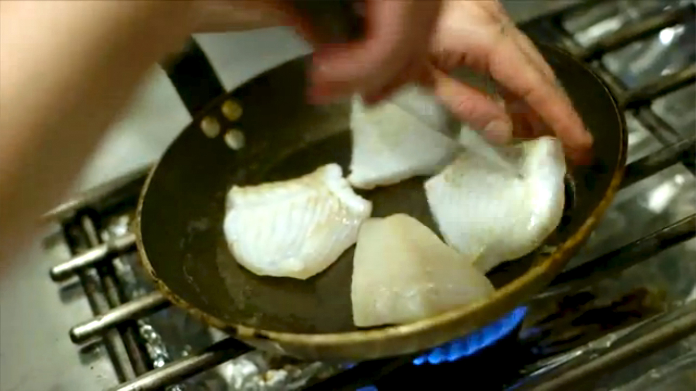 Chef Magnus Nilsson cooking fish