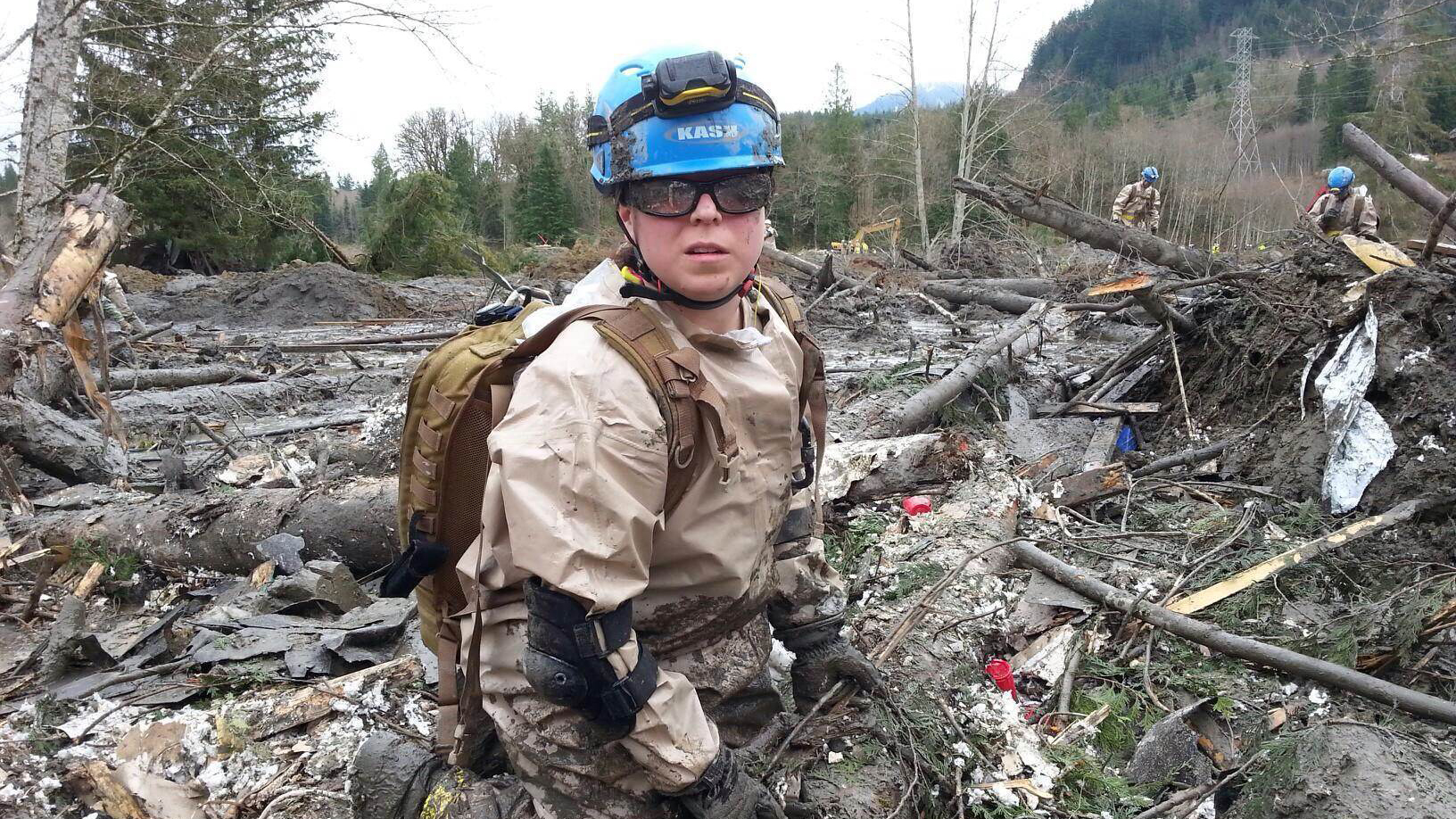 Air Force Staff Sgt. Patrick McGuire clearing debris to find missing persons following the Oso mudslide.