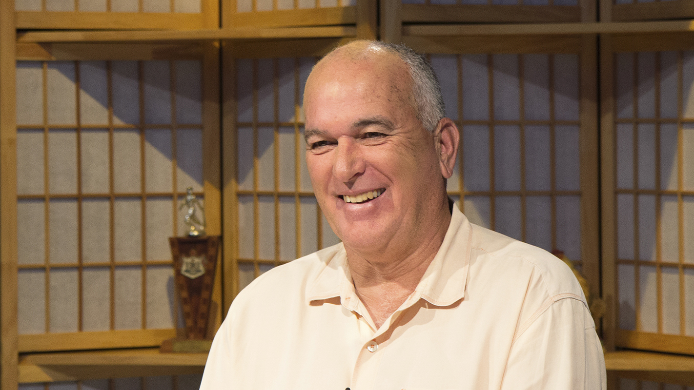 Jim and Kanoa welcome former University of Hawaii Head Football Coach June Jones to the kitchen table.