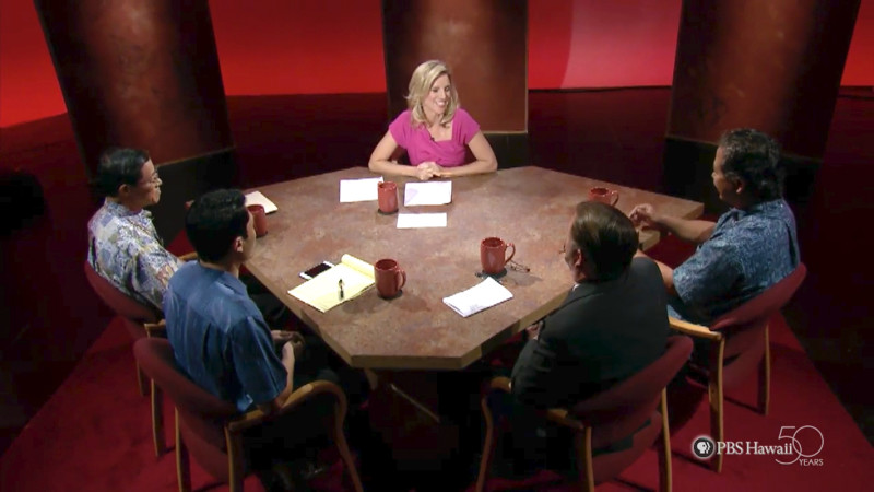 Malia Mattoch moderates a discussion on Hawaii's economy.