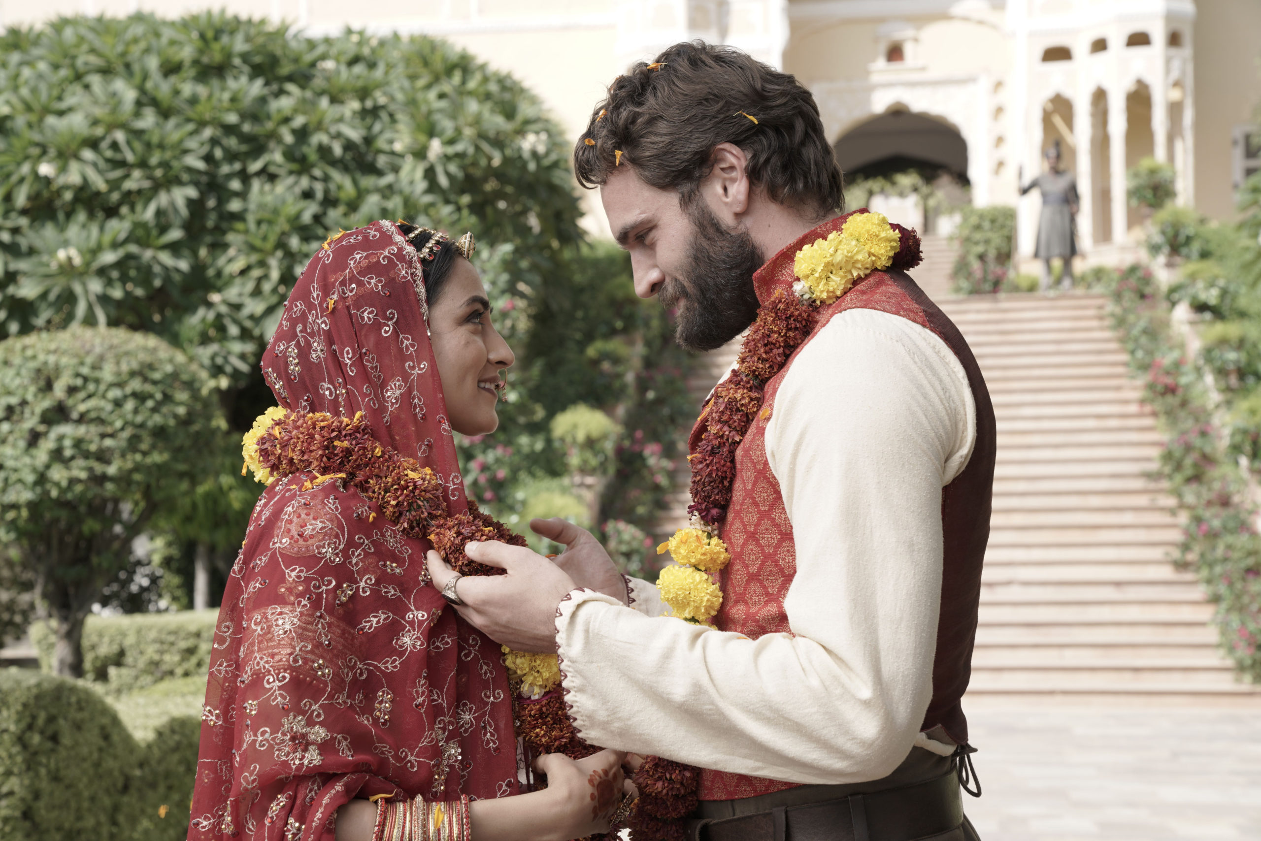 MASTERPIECE
“Beecham House"
Sunday, March 1 on PBS Passport

Episode Four
Just when John thinks all is going well, Chandrika visits his room late at night, witnessed by Violet who tells all to his mother. When Margaret learns of this, she makes clear her intentions to leave Delhi. John realises he has no choice but to reveal the truth about his past and the baby’s identity knowing that this could risk the safety of his child.

Shown from left to right: Saiyami Kher as Khamlavati and Tom Bateman as John Beecham

For editorial use only.

Courtesy of MASTERPIECE