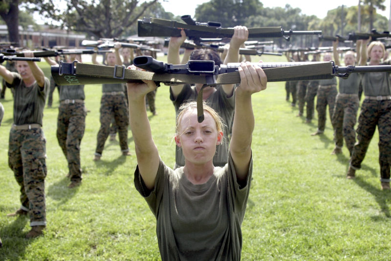 PARRIS ISLAND, SC - JUNE 23:  Female Marine Corps recruit Kylieanne Fortin, 20, of Williamsport, Maryland goes through close combat training at the United States Marine Corps recruit depot June 23, 2004 in Parris Island, South Carolina. Marine Corps boot camp, with its combination of strict discipline and exhaustive physical training, is considered the most rigorous of the armed forces recruit training. Congress is currently considering bills that could increase the size of the Marine Corps and the Army to help meet US military demands in Iraq and Afghanistan.  (Photo by Scott Olson/Getty Images)