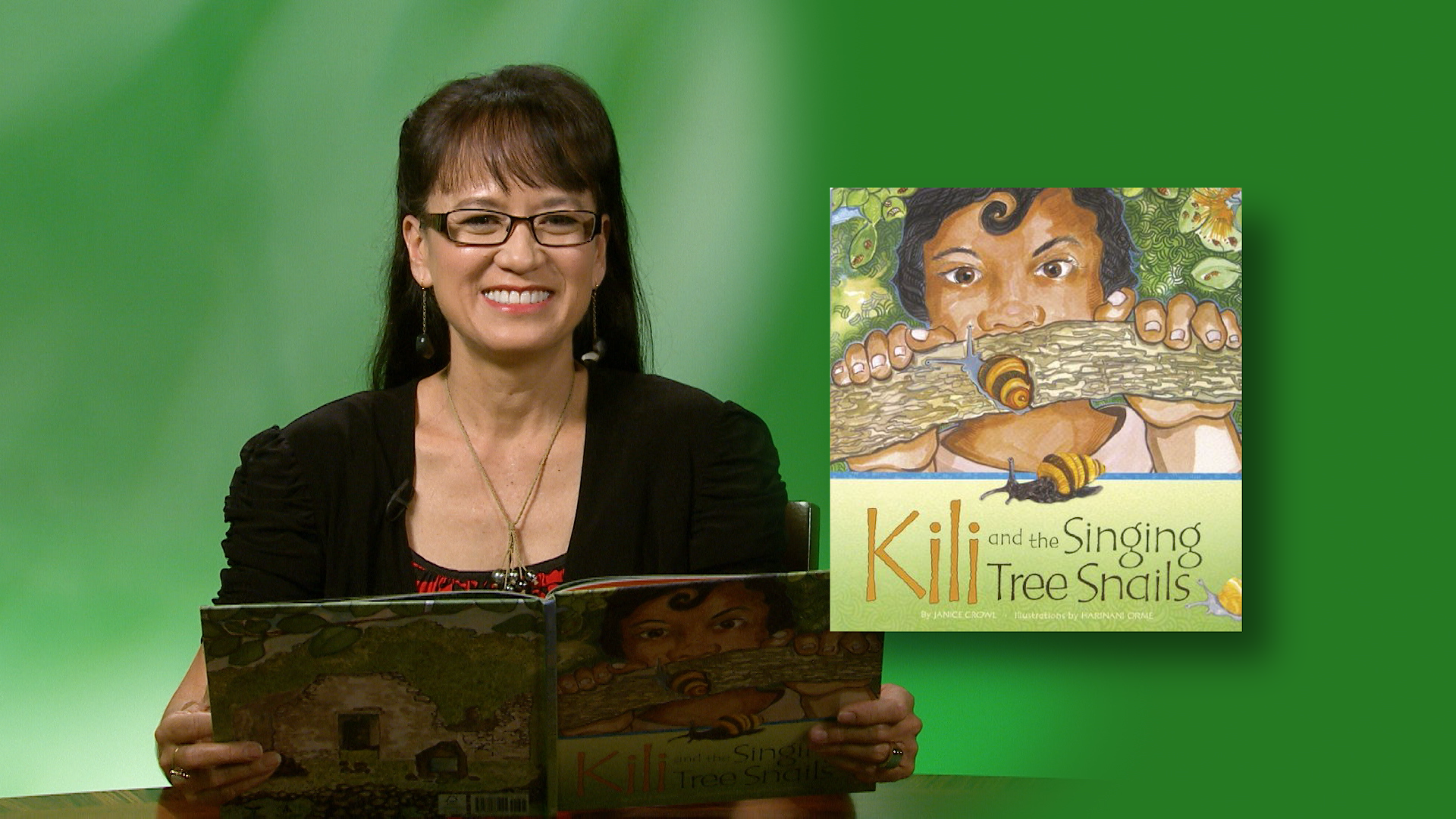 Maile Loo-Ching reads “Kili and the Singing Tree Snails” <br/>GET CAUGHT READING