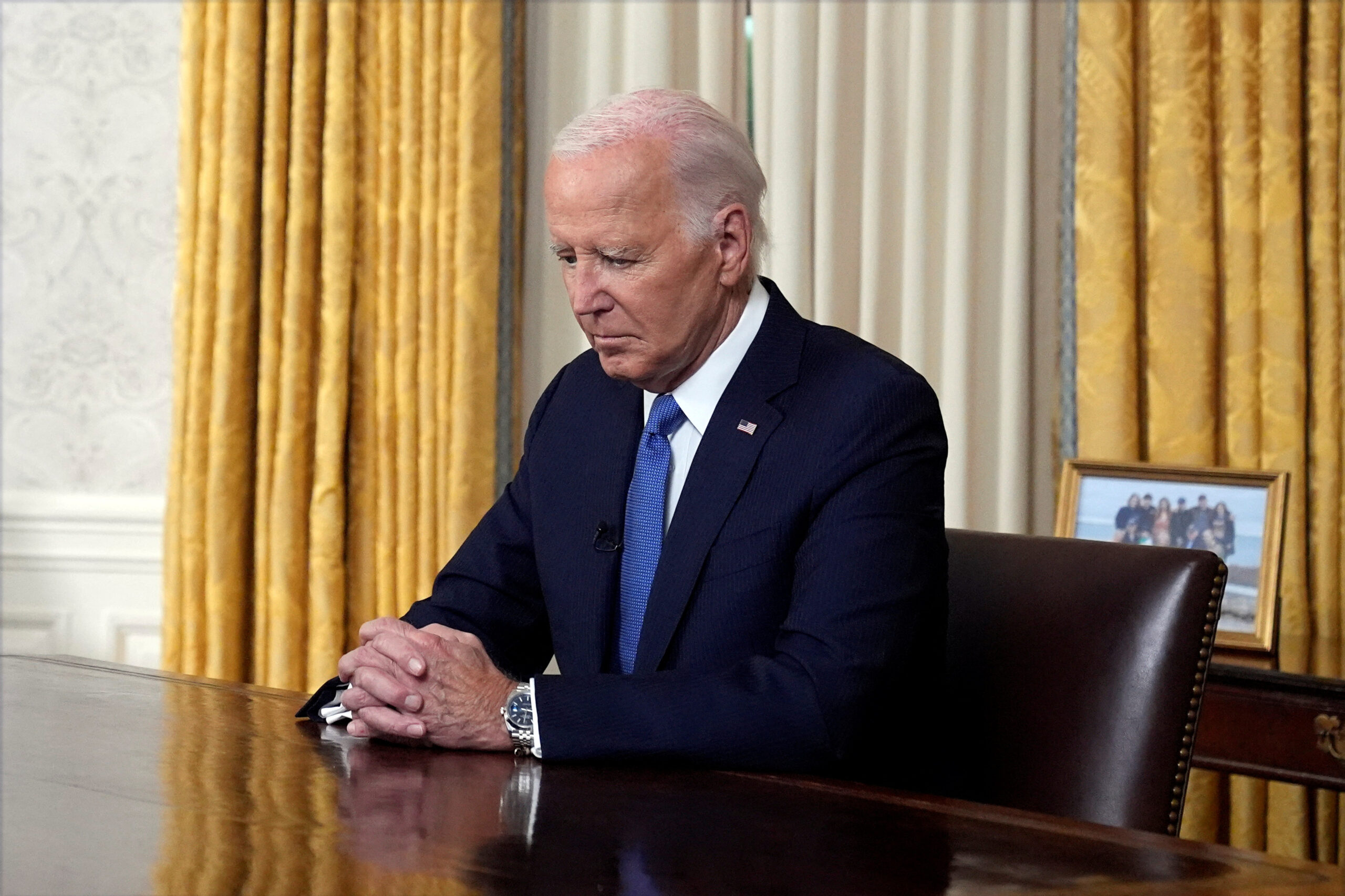 U.S. President Joe Biden pauses before addressing the nation from the Oval Office of the White House in Washington, Wednesday, July 24, 2024, about his decision to drop his Democratic presidential reelection bid.     Evan Vucci/Pool via REUTERS - RC2029AZK1QW