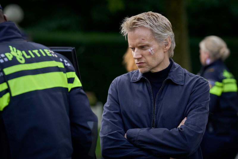 MASTERPIECE
Van der Valk, Season 4

Episode One “Safe in Amsterdam – Part 1” 
Sunday, September 15, 2024 at 10/9c on PBS

After a whistleblower is murdered under police protection, the team are called in to make sure the second whistleblower makes it to court to testify and take down a criminal empire. Van der Valk is conflicted when he finds out the protection officer in charge of the murdered whistleblower is a former flame of his.

Shown: Piet Van der Valk (Marc Warren)

Photographer: Mark de Blok

For editorial use only.

Courtesy of All3Media International and MASTERPIECE.