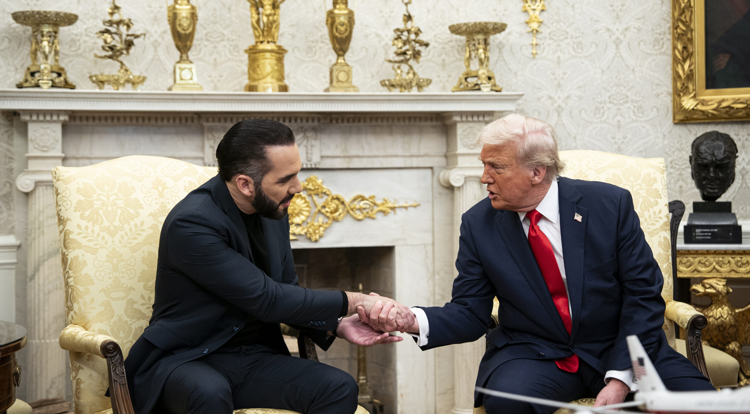 WASHINGTON, DC - APRIL 14: US President Donald Trump shakes hands with Nayib Bukele, El Salvador's president, during a meeting in the Oval Office of the White House in Washington, DC, US, on Monday, April 14, 2025. (Photo by Al Drago for The Washington Post via Getty Images)