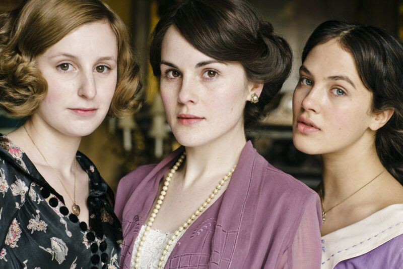 Downton Abbey on MASTERPIECE
Season 1
Shown from left to right: Laura Carmichael as Lady Edith Crawley, Michelle Dockery as Lady Mary Crawley and Jessica Brown Findlay as Lady Sybil Crawley
For editorial use only.

©Carnival Film &amp; Television Limited for MASTERPIECE